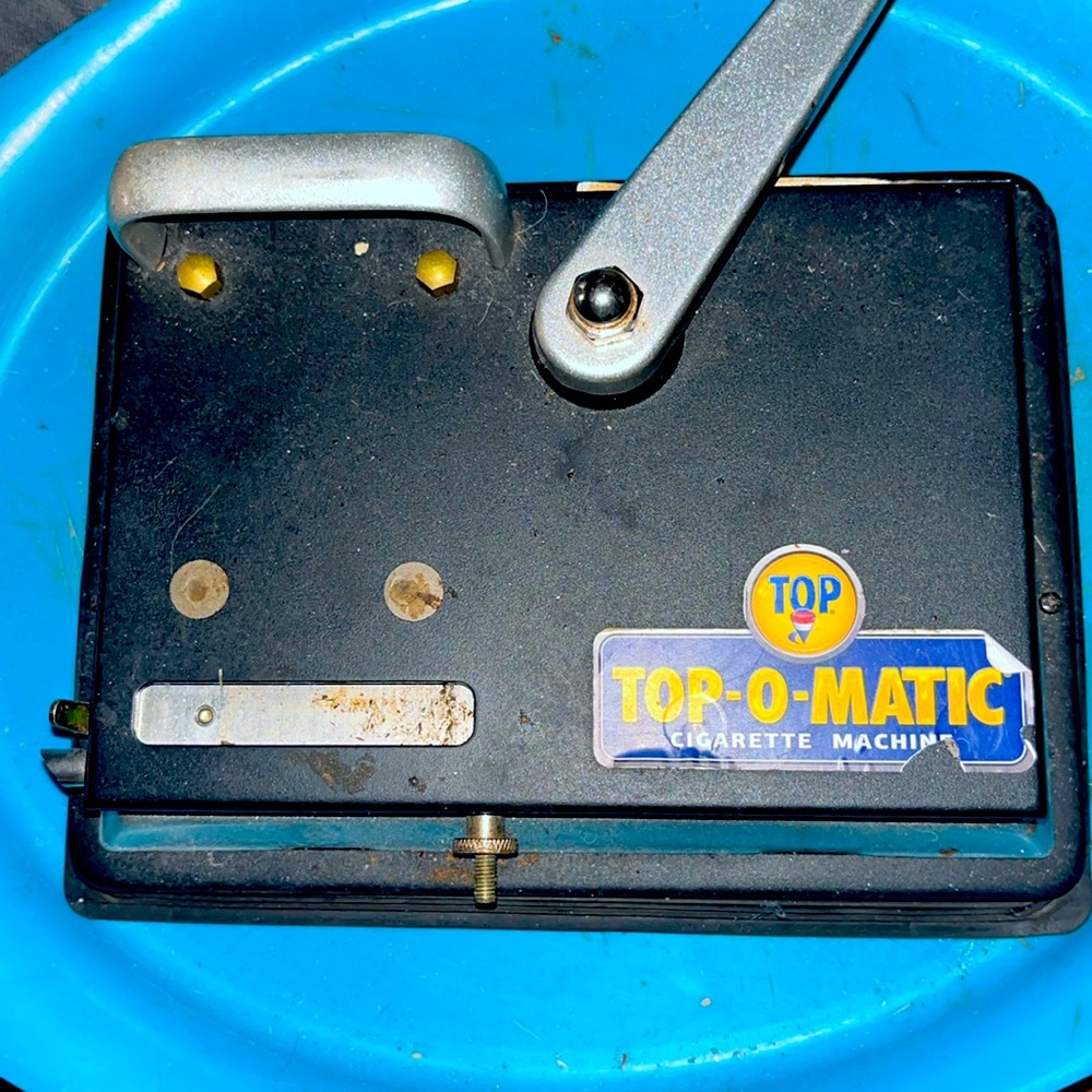 Tap O-Matic cigarette machine